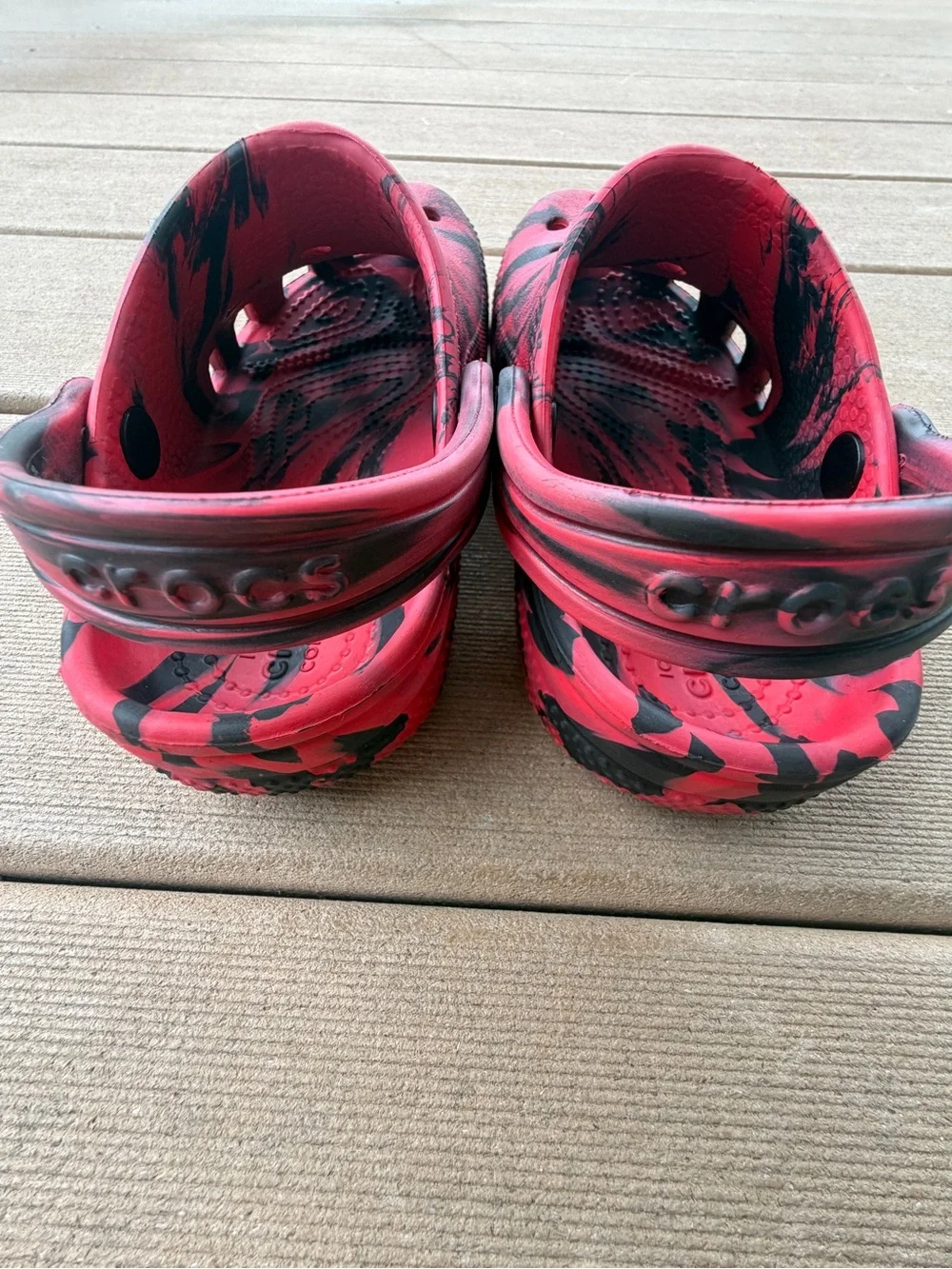 CROCS Kids Red and Black Marbled Clogs with Heel Strap